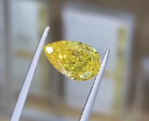 1.16ct Pear Cut Lab फैंसी ज्वलंत पीला HPHT हीरा VS1 स्पष्टता शादी के गहने के लिए आदर्श